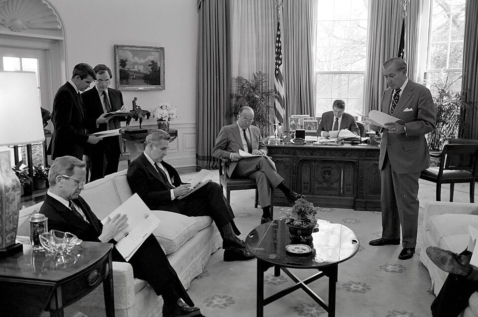 President Reagan in the Oval Office meeting with Robert McFarlane, Donald Regan, Oliver North and John Poindexter.