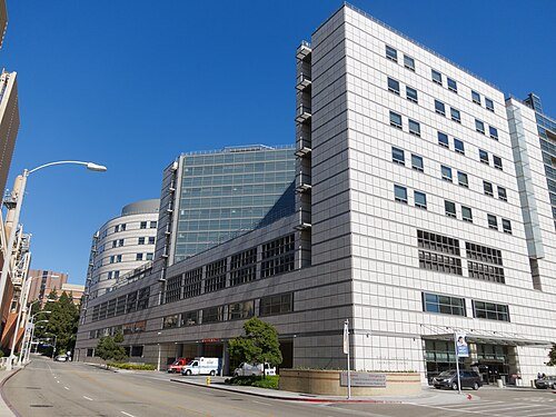 The modern glass and stone exterior of Ronald Reagan UCLA Medical Center in Los Angeles.