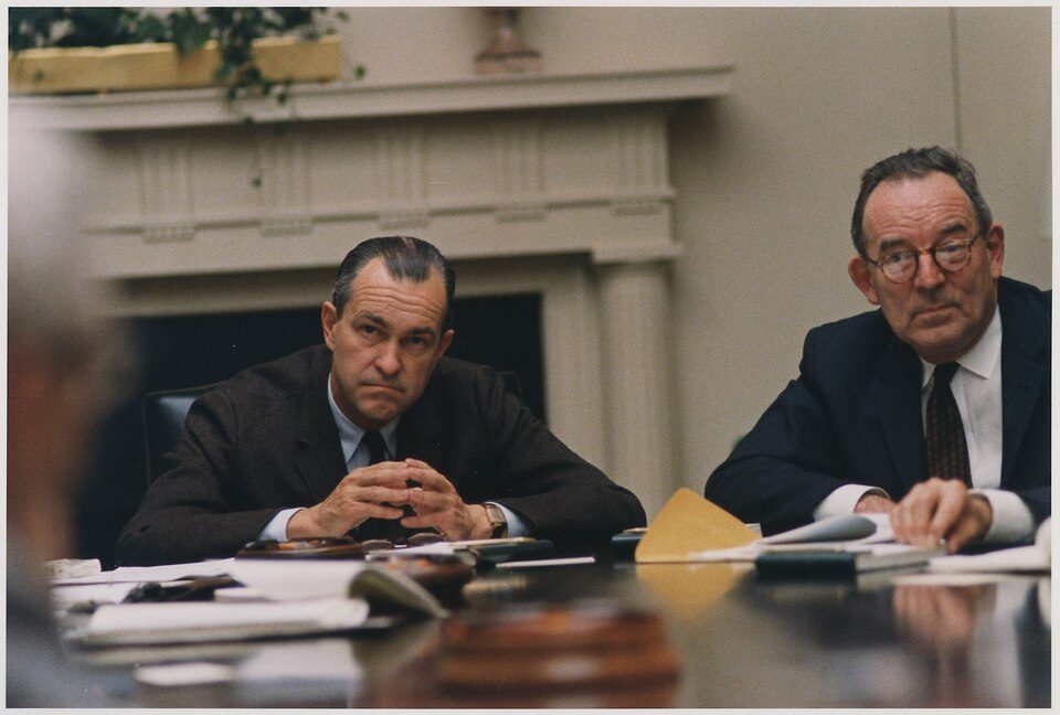 CIA Director Richard Helms seated at the long table in the White House Cabinet Room.