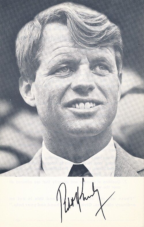 A black-and-white 1968 campaign photo of a smiling Robert F. Kennedy, with his printed signature below.